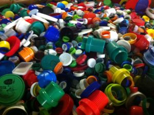 Plastic bottle shop cap recycling program